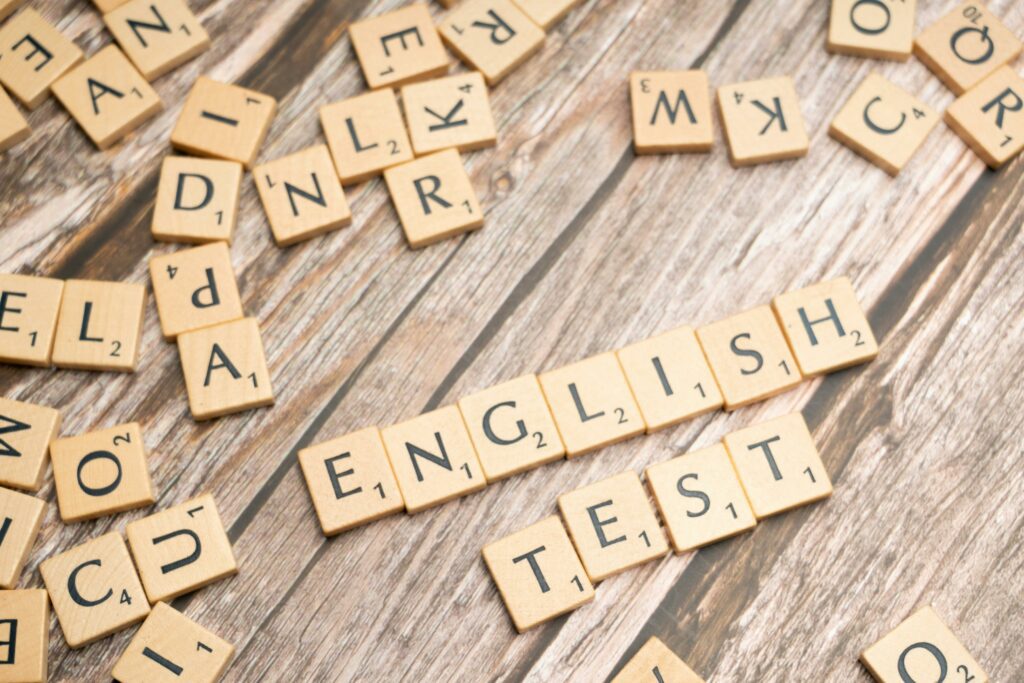 Scrabble letters with the words english test. Image is to portray the international language english test / IELTS